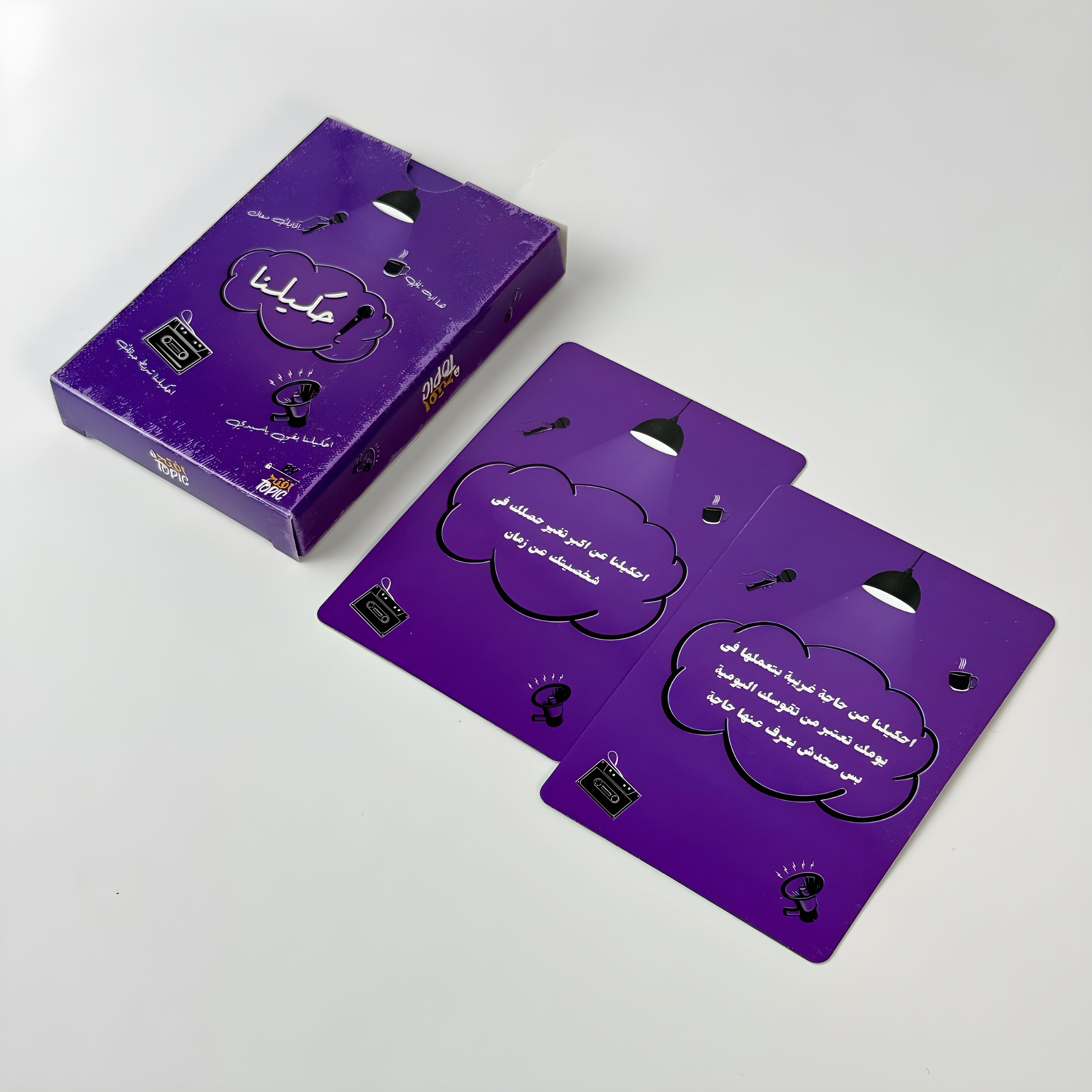 Purple playing cards with cloud design and text on a white background
